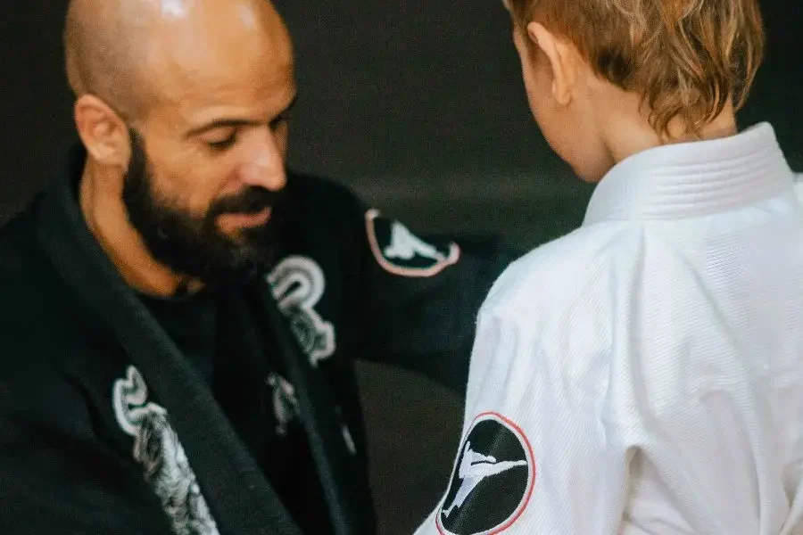 Kids BJJ tying the belt at BXB Fight Lab in Samui, Thailand